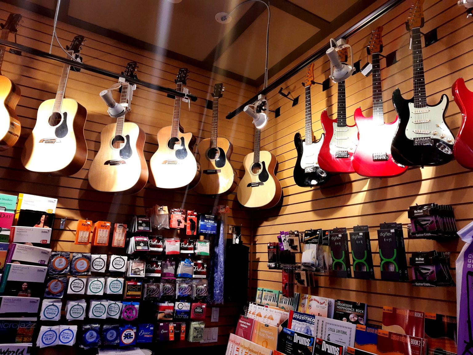 Guitar wall inside the Time Music Studios studio in West Springs